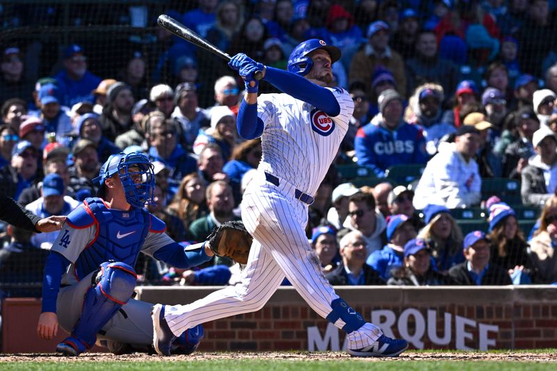 Apr 5, 2024; Chicago, Illinois, USA; Chicago Cubs first base Michael Busch (29) hits a solo home run during the third inning against the Los Angeles Dodgers at Wrigley Field. Mandatory Credit: Matt Marton-USA TODAY Sports