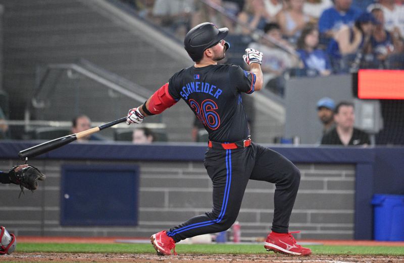 Jun 17, 2024; Toronto, Ontario, CAN;  Toronto Blue Jays second baseman Davis Schneider (36) hits a solo home run against the Boston Red Sox in the seventh inning at Rogers Centre. Mandatory Credit: Dan Hamilton-USA TODAY Sports