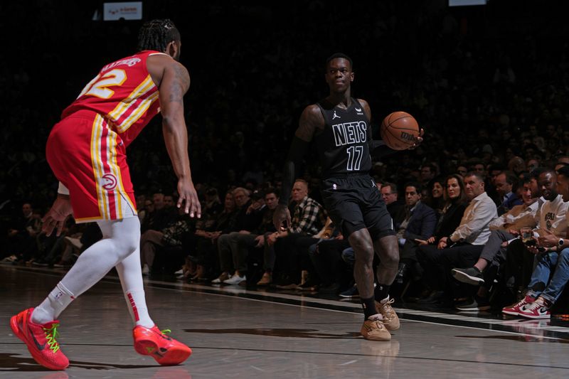 BROOKLYN, NY - FEBRUARY 29: Dennis Schroder #17 of the Brooklyn Nets dribbles the ball during the game against the Atlanta Hawks on February 29, 2024 at Barclays Center in Brooklyn, New York. NOTE TO USER: User expressly acknowledges and agrees that, by downloading and or using this Photograph, user is consenting to the terms and conditions of the Getty Images License Agreement. Mandatory Copyright Notice: Copyright 2024 NBAE (Photo by Jesse D. Garrabrant/NBAE via Getty Images)