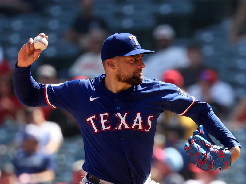 Sep 29, 2024; Anaheim, California, USA;  Texas Rangers starting pitcher Nathan Eovaldi (17) pitches during the third inning against the Los Angeles Angels at Angel Stadium. Mandatory Credit: Kiyoshi Mio-Imagn Images