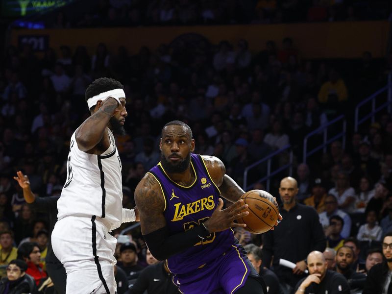 LOS ANGELES, CALIFORNIA - JANUARY 19:  LeBron James #23 of the Los Angeles Lakers in the first half at Crypto.com Arena on January 19, 2024 in Los Angeles, California.  NOTE TO USER: User expressly acknowledges and agrees that, by downloading and/or using this photograph, user is consenting to the terms and conditions of the Getty Images License Agreement.  (Photo by Ronald Martinez/Getty Images)