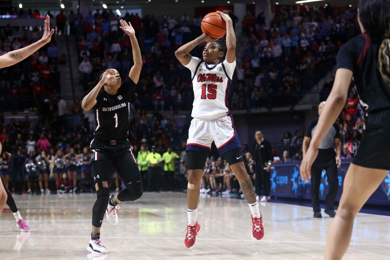 Feb 19, 2023; Oxford, Mississippi, USA; Mississippi Rebels guard Angel Baker (15) shoots during the second half against the South Carolina Gamecocks at The Sandy and John Black Pavilion at Ole Miss. Mandatory Credit: Petre Thomas-USA TODAY Sports