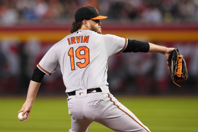 Sep 1, 2023; Phoenix, Arizona, USA; Baltimore Orioles starting pitcher Cole Irvin (19) pitches against the Arizona Diamondbacks during the first inning at Chase Field. Mandatory Credit: Joe Camporeale-USA TODAY Sports