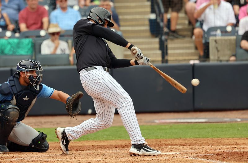 Mar 6, 2024; Tampa, Florida, USA; New York Yankees first baseman Anthony Rizzo (48) singles during the fourth inning against the Tampa Bay Rays at George M. Steinbrenner Field. Mandatory Credit: Kim Klement Neitzel-USA TODAY Sports