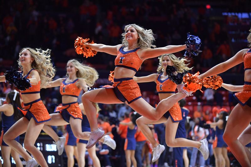 Nov 17, 2023; Champaign, Illinois, USA; The Illinois Fighting Illini cheer team performs during the second half against the Valparaiso Beacons at  State Farm Center. Mandatory Credit: Ron Johnson-USA TODAY Sports