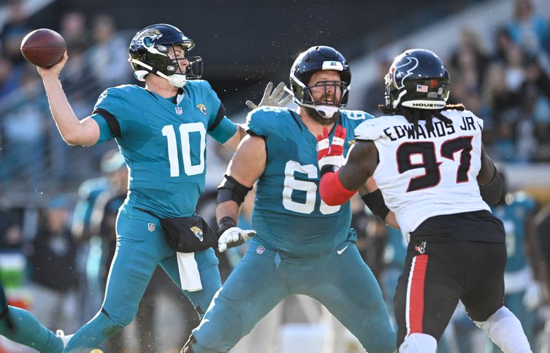 Jacksonville Jaguars quarterback Mac Jones (10) throwa a pass against the Houston Texans during the second half of an NFL football game Sunday, Dec. 1, 2024, in Jacksonville, Fla. (AP Photo/Phelan M. Ebenhack)