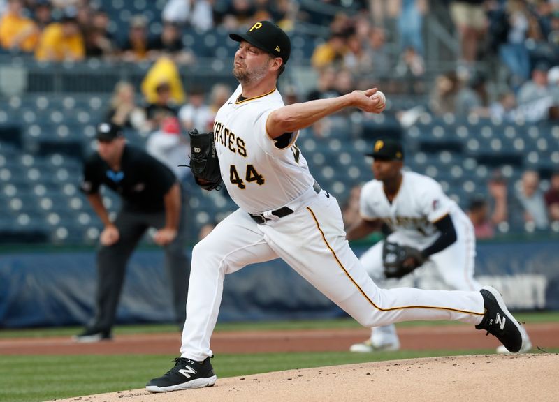 May 23, 2023; Pittsburgh, Pennsylvania, USA;  Pittsburgh Pirates starting pitcher Rich Hill (44) delivers a pitch against the Texas Rangers during the first inning at PNC Park. Mandatory Credit: Charles LeClaire-USA TODAY Sports