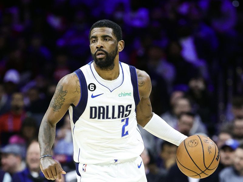 PHILADELPHIA, PENNSYLVANIA - MARCH 29: Kyrie Irving #2 of the Dallas Mavericks dribbles during the third quarter against the Philadelphia 76ers at Wells Fargo Center on March 29, 2023 in Philadelphia, Pennsylvania. NOTE TO USER: User expressly acknowledges and agrees that, by downloading and or using this photograph, User is consenting to the terms and conditions of the Getty Images License Agreement. (Photo by Tim Nwachukwu/Getty Images)