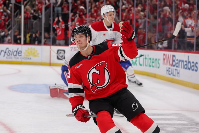 Nov 6, 2025; Newark, New Jersey, USA; New Jersey Devils left wing Jesper Bratt (63) celebrates his game winning goal in overtime against the Montreal Canadiens at Prudential Center. Mandatory Credit: Ed Mulholland-Imagn Images