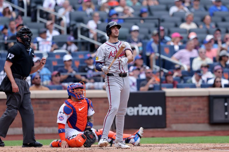 Jul 28, 2024; New York City, New York, USA; Atlanta Braves first baseman Matt Olson (28) watches his three run home run against the New York Mets during the fourth inning at Citi Field. Mandatory Credit: Brad Penner-USA TODAY Sports