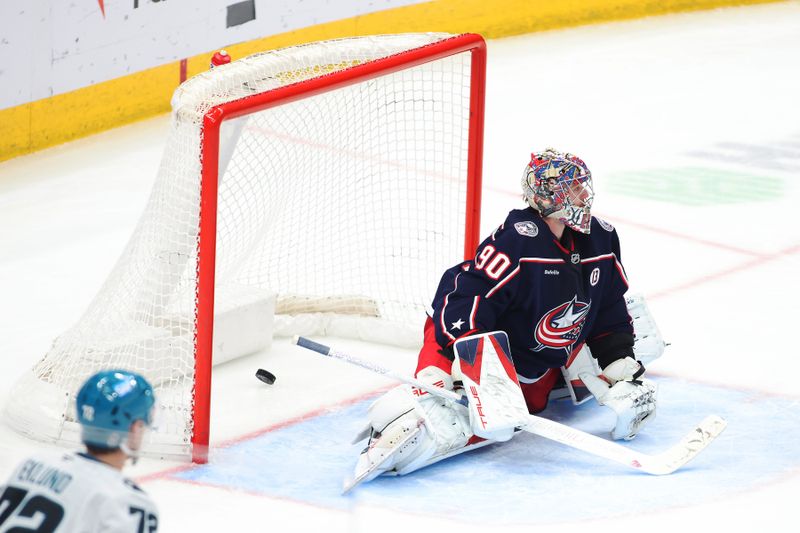Jan 16, 2025; Columbus, Ohio, USA; Columbus Blue Jackets goaltender Elvis Merzlikins (90) allows his lone goal for the game during the third period against the San Jose Sharks at Nationwide Arena. Mandatory Credit: Joseph Maiorana-Imagn Images