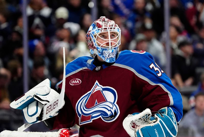 Jan 14, 2025; Denver, Colorado, USA; Colorado Avalanche goaltender Mackenzie Blackwood (39) during the first period against the New York Rangers at Ball Arena. Mandatory Credit: Ron Chenoy-Imagn Images