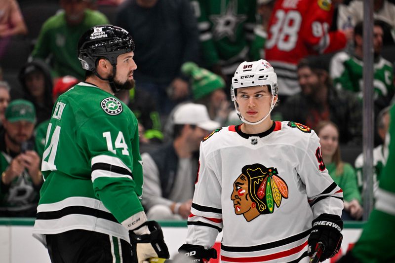 Nov 7, 2024; Dallas, Texas, USA; Dallas Stars left wing Jamie Benn (14) and Chicago Blackhawks center Connor Bedard (98) look on during the third period at the American Airlines Center. Mandatory Credit: Jerome Miron-Imagn Images