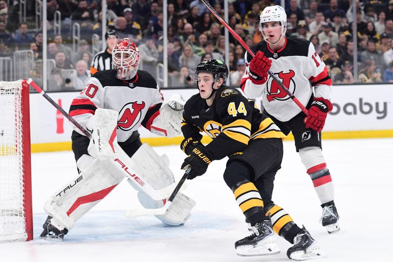 Apr 14, 2026; Boston, Massachusetts, USA; New Jersey Devils goalie Nico Daws (50) looks on as defenseman Simon Nemec (17) and Boston Bruins forward James hagen (44) go after the puck during the first period at TD Garden. Mandatory Credit: Bob DeChiara-Imagn Images Apr 14, 2026; Boston, Massachusetts, USA; New Jersey Devils goalie Nico Daws (50) looks on as defenseman Simon Nemec (17) and Boston Bruins forward James hagen (44) go after the puck during the first period at TD Garden. Mandatory Credit: Bob DeChiara-Imagn Images