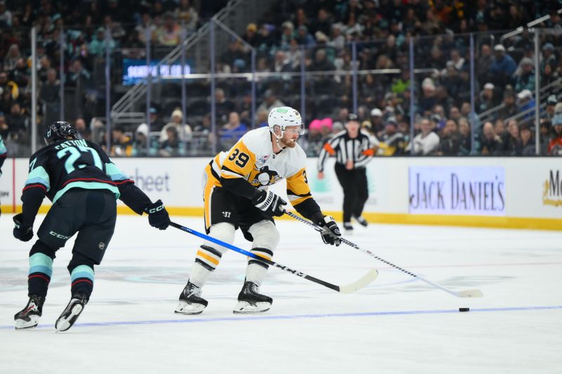 Jan 19, 2026; Seattle, Washington, USA; Pittsburgh Penguins right wing Anthony Mantha (39) advances the puck against the Seattle Kraken during the second period at Climate Pledge Arena. Mandatory Credit: Steven Bisig-Imagn Images