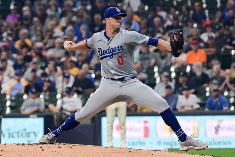 Aug 15, 2024; Milwaukee, Wisconsin, USA; Los Angeles Dodgers starting pitcher Jack Flaherty (0) throws against the Milwaukee Brewers in the first inning at American Family Field. Mandatory Credit: Benny Sieu-USA TODAY Sports