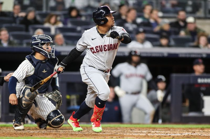 May 2, 2023; Bronx, New York, USA;  Cleveland Guardians third baseman Jose Ramirez (11) hits a single in the fifth inning against the New York Yankees at Yankee Stadium. Mandatory Credit: Wendell Cruz-USA TODAY Sports