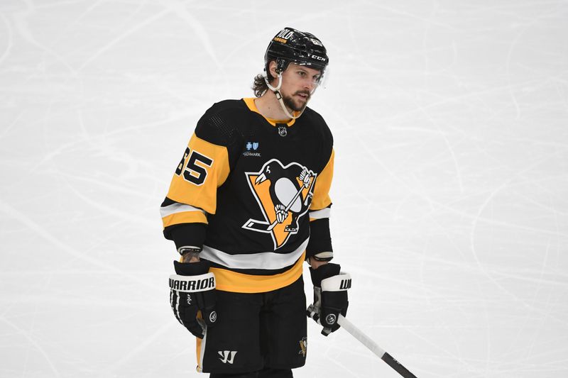 Apr 13, 2024; Pittsburgh, Pennsylvania, USA; Pittsburgh Penguins defenseman Erik Karlsson (65) heads to the penalty box against the Boston Bruins during the third period at PPG Paints Arena. Mandatory Credit: Philip G. Pavely-USA TODAY Sports