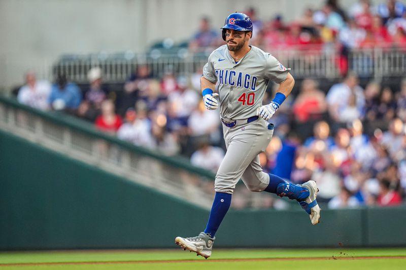 May 15, 2024; Cumberland, Georgia, USA; Chicago Cubs left fielder Mike Tauchman (40) runs the bases after hitting a home run against the Atlanta Braves during the first inning at Truist Park. Mandatory Credit: Dale Zanine-USA TODAY Sports