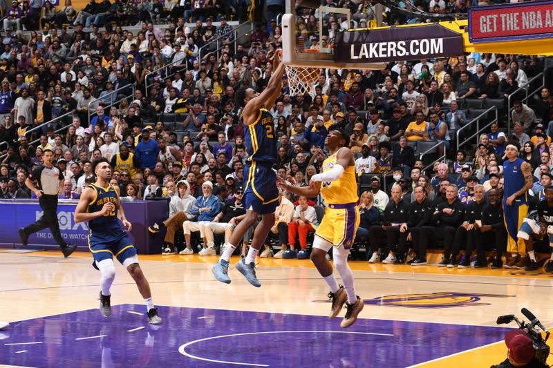 LOS ANGELES, CA - APRIL 9: Andrew Wiggins #22 of the Golden State Warriors dunks the ball during the game against the Los Angeles Lakers on April 9, 2024 at Crypto.Com Arena in Los Angeles, California. NOTE TO USER: User expressly acknowledges and agrees that, by downloading and/or using this Photograph, user is consenting to the terms and conditions of the Getty Images License Agreement. Mandatory Copyright Notice: Copyright 2024 NBAE (Photo by Andrew D. Bernstein/NBAE via Getty Images)