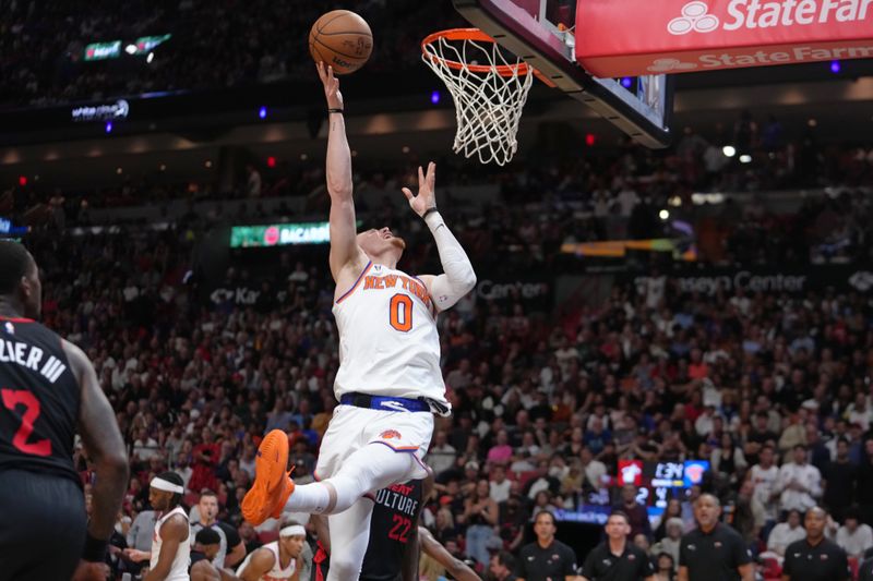 MIAMI, FL - APRIL 2: Donte Divincenzo #0 of the New York Knicks shoots the ball during the game against the Miami Heat on April 2, 2024 at Kaseya Center in Miami, Florida. NOTE TO USER: User expressly acknowledges and agrees that, by downloading and or using this Photograph, user is consenting to the terms and conditions of the Getty Images License Agreement. Mandatory Copyright Notice: Copyright 2024 NBAE (Photo by Eric Espada/NBAE via Getty Images)