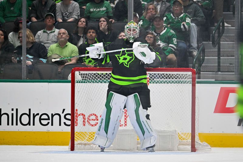 Mar 14, 2024; Dallas, Texas, USA; Dallas Stars goaltender Jake Oettinger (29) reacts to giving up a fourth goal to the New Jersey Devils during the second period at the American Airlines Center. Mandatory Credit: Jerome Miron-USA TODAY Sports