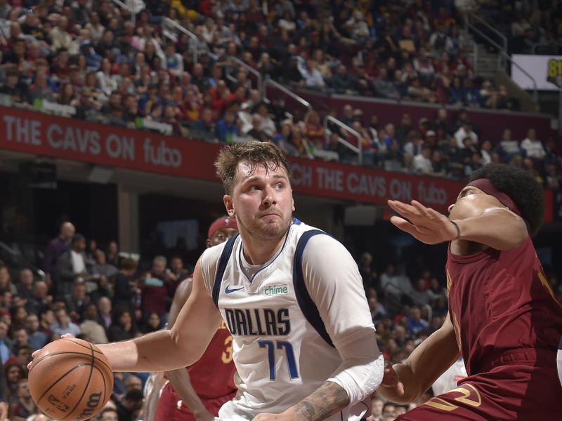 CLEVELAND, OH - FEBRUARY 27: Luka Doncic #77 of the Dallas Mavericks dribbles the ball during the game against the Cleveland Cavaliers on February 27, 2024 at Rocket Mortgage FieldHouse in Cleveland, Ohio. NOTE TO USER: User expressly acknowledges and agrees that, by downloading and/or using this Photograph, user is consenting to the terms and conditions of the Getty Images License Agreement. Mandatory Copyright Notice: Copyright 2024 NBAE (Photo by David Liam Kyle/NBAE via Getty Images)