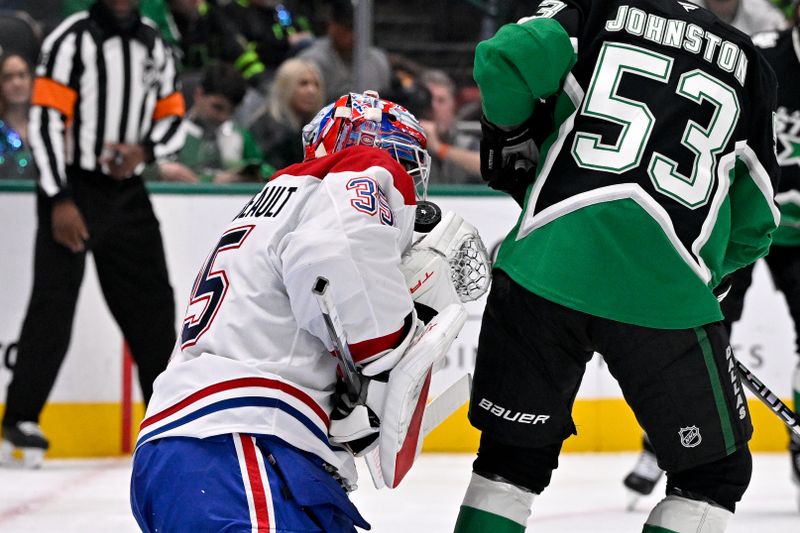 Jan 4, 2026; Dallas, Texas, USA; Montreal Canadiens goaltender Sam Montembeault (35) makes a save in front of Dallas Stars center Wyatt Johnston (53) during the second period at the American Airlines Center. Mandatory Credit: Jerome Miron-Imagn Images
