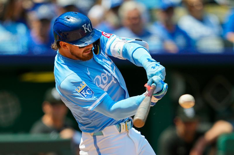 May 8, 2025; Kansas City, Missouri, USA; Kansas City Royals shortstop Bobby Witt Jr. (7) hits a single during the third inning against the Chicago White Sox at Kauffman Stadium. Mandatory Credit: Jay Biggerstaff-Imagn Images