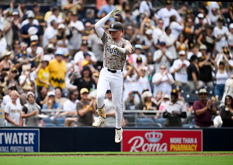 Sep 14, 2025; San Diego, California, USA; San Diego Padres center fielder Jackson Merrill (3) celebrates after hitting a three-run home run during the second inning against the Colorado Rockies at Petco Park. Mandatory Credit: Denis Poroy-Imagn Images