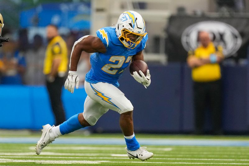 Los Angeles Chargers running back J.K. Dobbins (27) carries in the second half of an NFL football game against the New Orleans Saints in Inglewood, Calif., Sunday, Oct. 27, 2024. (AP Photo/Mark J. Terrill)
