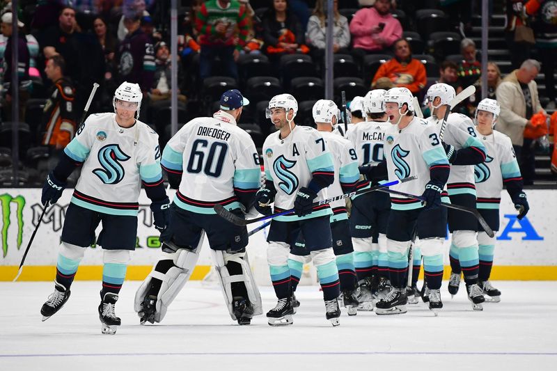 Dec 23, 2023; Anaheim, California, USA; Seattle Kraken celebrate the victory agaisnt the Anaheim Ducks at Honda Center. Mandatory Credit: Gary A. Vasquez-USA TODAY Sports