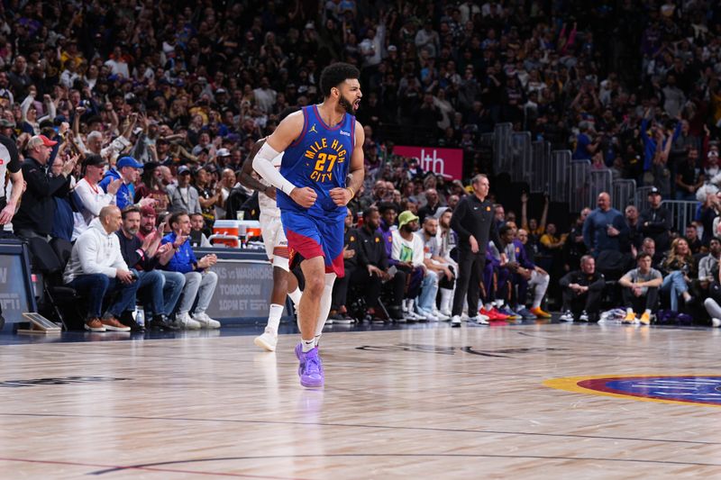 DENVER, CO - MARCH 5: Jamal Murray #27 of the Denver Nuggets celebrates during the game against the Phoenix Suns on March 5, 2024 at the Ball Arena in Denver, Colorado. NOTE TO USER: User expressly acknowledges and agrees that, by downloading and/or using this Photograph, user is consenting to the terms and conditions of the Getty Images License Agreement. Mandatory Copyright Notice: Copyright 2024 NBAE (Photo by Garrett Ellwood/NBAE via Getty Images)