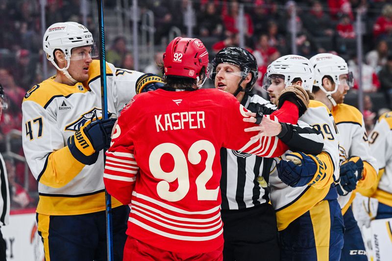 Nov 26, 2025; Detroit, Michigan, USA; Nashville Predators right wing Michael McCarron (47), right wing Ozzy Wiesblatt (89), and Detroit Red Wings center Marco Kasper (92) are broken up during the game at Little Caesars Arena. Mandatory Credit: Tim Fuller-Imagn Images