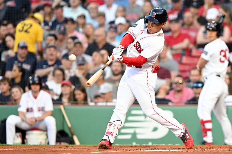 May 31, 2023; Boston, Massachusetts, USA; Boston Red Sox left fielder Masataka Yoshida (7) this a solo home run against the Cincinnati Reds during the second inning at Fenway Park. Mandatory Credit: Brian Fluharty-USA TODAY Sports