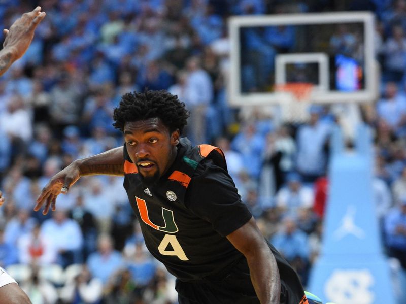 Feb 13, 2023; Chapel Hill, North Carolina, USA; Miami (Fl) Hurricanes guard Bensley Joseph (4) dribbles in the first half at Dean E. Smith Center. Mandatory Credit: Bob Donnan-USA TODAY Sports