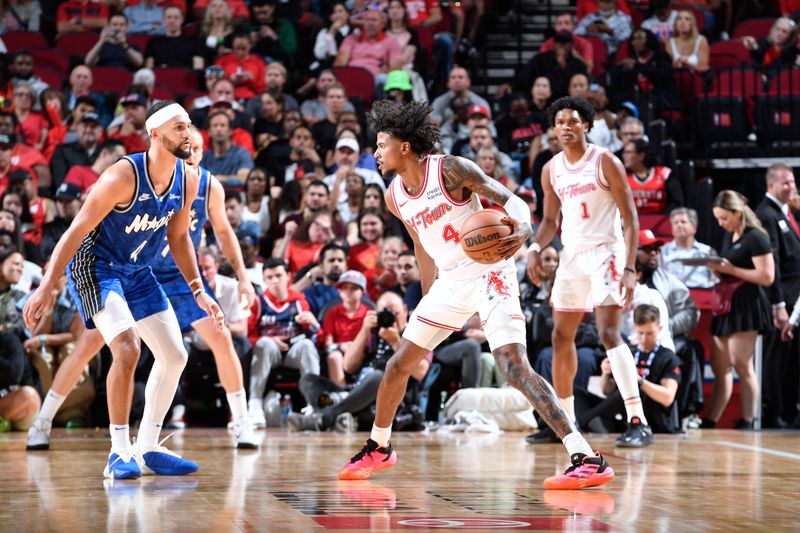 HOUSTON, TX - APRIL 9: Jalen Green #4 of the Houston Rockets handles the ball during the game against the Orlando Magic on April 9, 2024 at the Toyota Center in Houston, Texas. NOTE TO USER: User expressly acknowledges and agrees that, by downloading and or using this photograph, User is consenting to the terms and conditions of the Getty Images License Agreement. Mandatory Copyright Notice: Copyright 2024 NBAE (Photo by Logan Riely/NBAE via Getty Images)