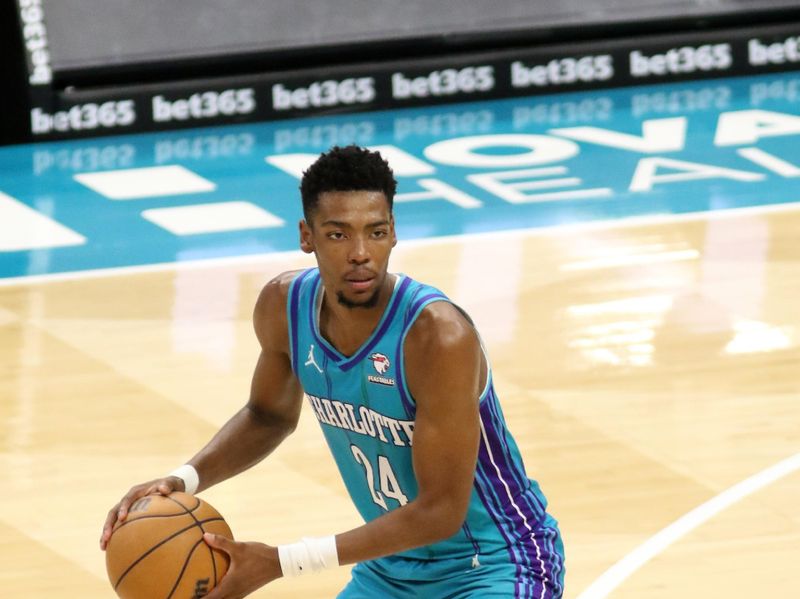 CHARLOTTE, NC - APRIL 1: Brandon Miller #24 of the Charlotte Hornets handles the ball during the game against the Boston Celtics on April 1, 2024 at Spectrum Center in Charlotte, North Carolina. NOTE TO USER: User expressly acknowledges and agrees that, by downloading and or using this photograph, User is consenting to the terms and conditions of the Getty Images License Agreement.  Mandatory Copyright Notice:  Copyright 2024 NBAE (Photo by Brock Williams-Smith/NBAE via Getty Images)