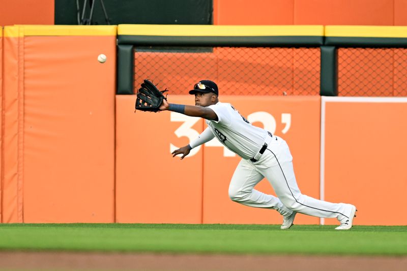 Aug 14, 2024; Detroit, Michigan, USA;  Detroit Tigers left fielder Justyn-Henry Malloy (44) makes a catch to take a hit away from the Seattle Mariners in the fifth inning at Comerica Park. Mandatory Credit: Lon Horwedel-USA TODAY Sports