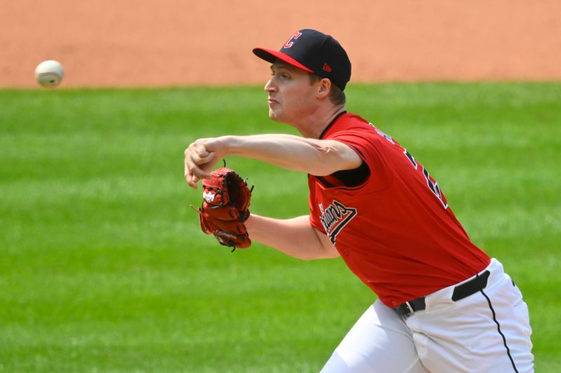 May 5, 2024; Cleveland, Ohio, USA; Cleveland Guardians relief pitcher Tim Herrin (29) delivers a pitch in the eighth inning Los Angeles Angels at Progressive Field. Mandatory Credit: David Richard-USA TODAY Sports