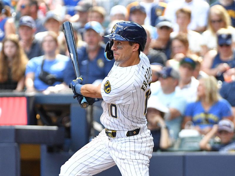 Jun 29, 2024; Milwaukee, Wisconsin, USA; Milwaukee Brewers outfielder Sal Frelick (10) gets a base hit in the fourth inning abasing the Chicago Cubs at American Family Field. Mandatory Credit: Michael McLoone-USA TODAY Sports