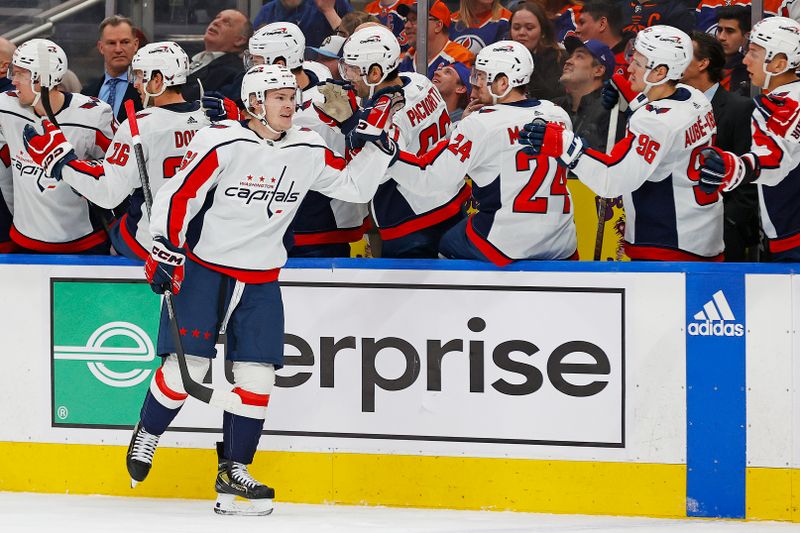 Mar 13, 2024; Edmonton, Alberta, CAN; The Washington Capitals celebrate a goal scored by Washington Capitals forward Ivan Miroshinchenko (63), his first in the NHL during the first period against the Edmonton Oilers at Rogers Place. Mandatory Credit: Perry Nelson-USA TODAY Sports