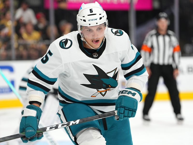 Sep 30, 2022; Las Vegas, Nevada, USA;  San Jose Sharks defenseman Matt Benning (5) skates against the Vegas Golden Knights during the second period of a preseason game at T-Mobile Arena. Mandatory Credit: Stephen R. Sylvanie-USA TODAY Sports