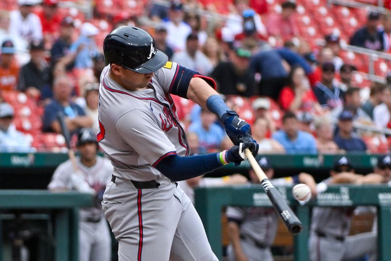 Jun 26, 2024; St. Louis, Missouri, USA;  Atlanta Braves third baseman Austin Riley (27) hits a single against the St. Louis Cardinals during the second inning at Busch Stadium. Mandatory Credit: Jeff Curry-USA TODAY Sports