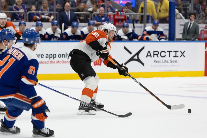 Nov 25, 2023; Elmont, New York, USA; Philadelphia Flyers left wing Joel Farabee (86) makes a pass against the New York Islanders during the third period at UBS Arena. Mandatory Credit: Thomas Salus-USA TODAY Sports