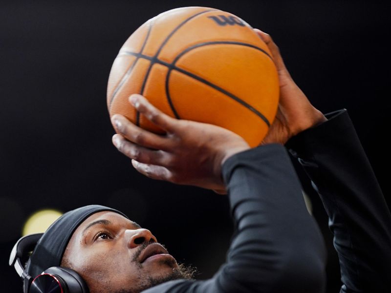 TORONTO, CANADA - JANUARY 17: Jimmy Butler #22 of the Miami Heat warms up before the game against the Toronto Raptors on January 17, 2024 at the Scotiabank Arena in Toronto, Ontario, Canada.  NOTE TO USER: User expressly acknowledges and agrees that, by downloading and or using this Photograph, user is consenting to the terms and conditions of the Getty Images License Agreement.  Mandatory Copyright Notice: Copyright 2024 NBAE (Photo by Mark Blinch/NBAE via Getty Images)