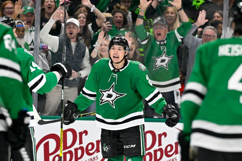 May 1, 2024; Dallas, Texas, USA; Dallas Stars left wing Jason Robertson (21) celebrates after he scores a goal on a power play against the Vegas Golden Knights during the second period in game five of the first round of the 2024 Stanley Cup Playoffs at the American Airlines Center. Mandatory Credit: Jerome Miron-USA TODAY Sports