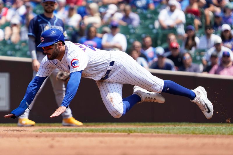 May 31, 2023; Chicago, Illinois, USA;  Chicago Cubs center fielder Mike Tauchman (40) attempts to steal second base against the Tampa Bay Rays during the first inning at Wrigley Field. Mandatory Credit: David Banks-USA TODAY Sports