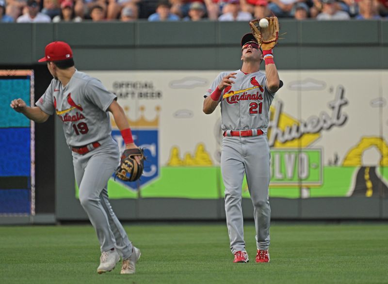 Aug 12, 2023; Kansas City, Missouri, USA;  St. Louis Cardinals center fielder Lars Nootbaar (21) catches a fly ball in the third inning against the Kansas City Royals at Kauffman Stadium. Mandatory Credit: Peter Aiken-USA TODAY Sports