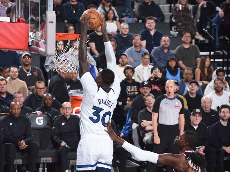 INGLEWOOD, CA - DECEMBER 4:  Julius Randle #30 of the Minnesota Timberwolves dunks the ball during the game against the LA Clippers during a regular season game on December 4, 2024 at Intuit Dome in Los Angeles, California. NOTE TO USER: User expressly acknowledges and agrees that, by downloading and/or using this Photograph, user is consenting to the terms and conditions of the Getty Images License Agreement. Mandatory Copyright Notice: Copyright 2024 NBAE (Photo by Juan Ocampo/NBAE via Getty Images)